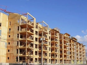 Сделан важный шаг в расширении применения деревянных конструкций в российском жилищном строительстве